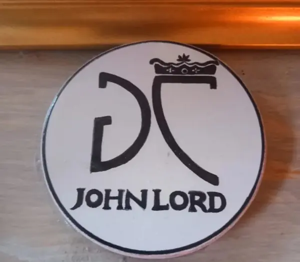 The John Lord mark, artist and designer